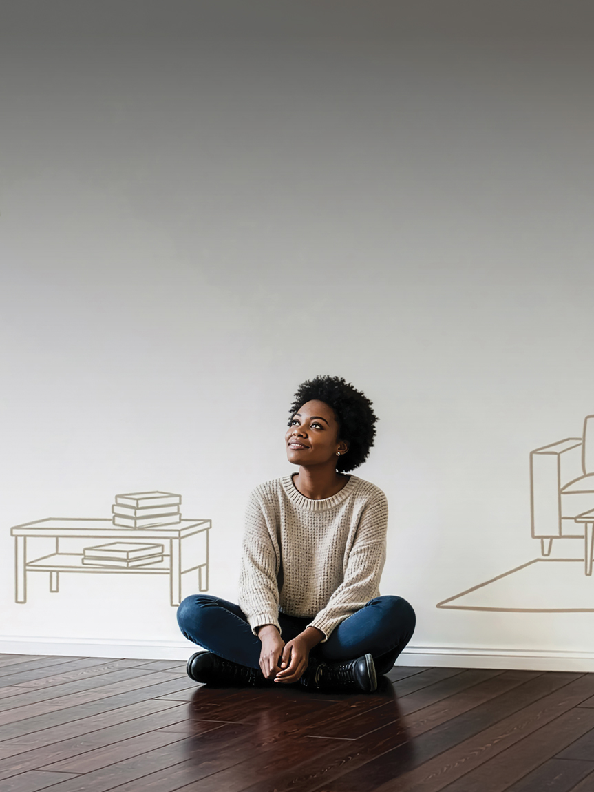 Woman sitting on Hardwood Floor